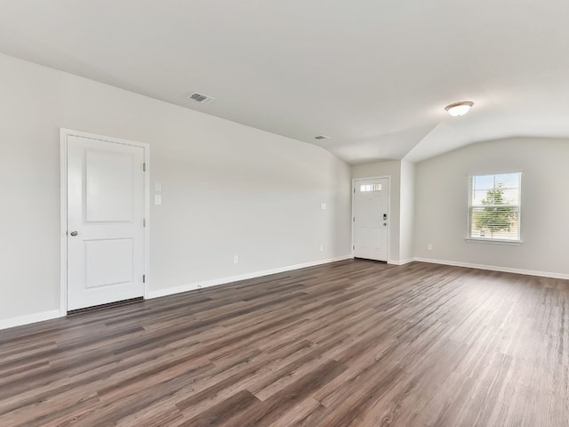 249 Boatright Blvd, Jarrell, TX 76537 - spare room with dark wood finished floors, baseboards, and lofted ceiling