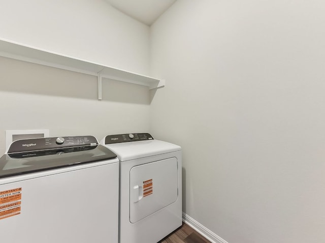 249 Boatright Blvd, Jarrell, TX 76537 - laundry area with washing machine and dryer, baseboards, and dark wood finished floors