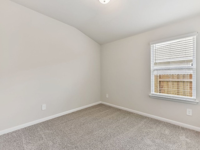 249 Boatright Blvd, Jarrell, TX 76537 - carpeted spare room featuring lofted ceiling and baseboards