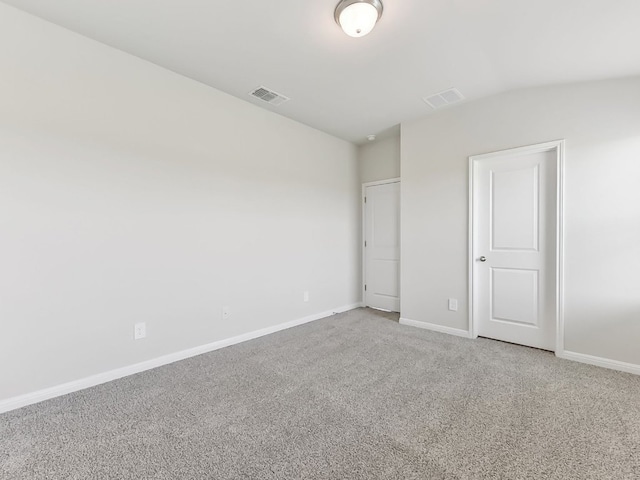249 Boatright Blvd, Jarrell, TX 76537 - unfurnished bedroom featuring carpet floors, baseboards, and lofted ceiling