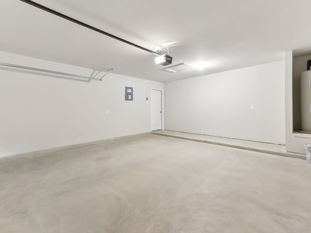 249 Boatright Blvd, Jarrell, TX 76537 - garage with a garage door opener, electric panel, and water heater