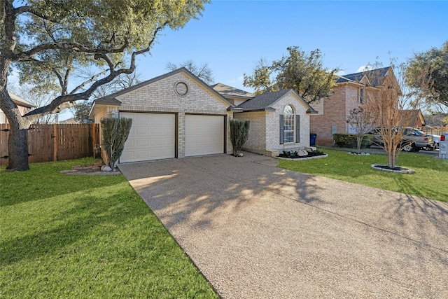 ranch-style house with a garage, an outdoor structure, and a front yard