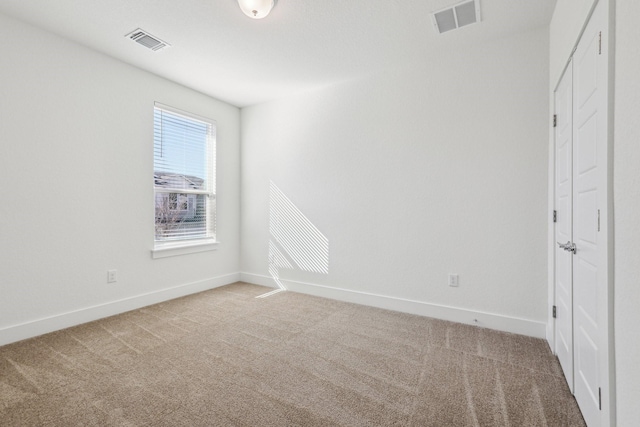 view of carpeted spare room