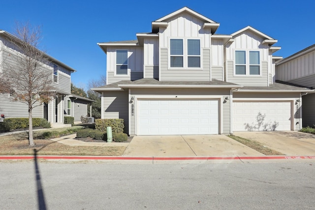 townhome / multi-family property featuring a garage