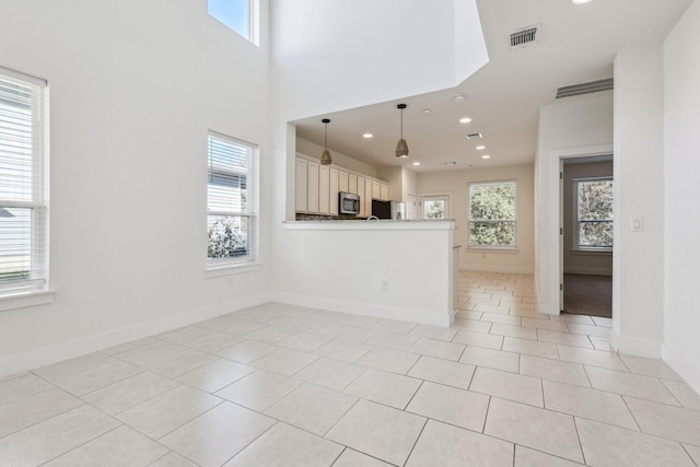 interior space with light tile patterned floors