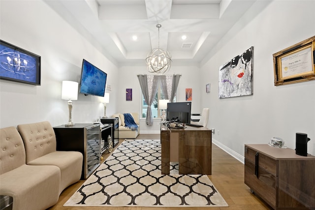 office space featuring a notable chandelier and hardwood / wood-style flooring