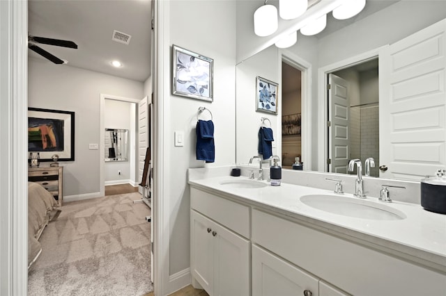 bathroom with vanity and ceiling fan