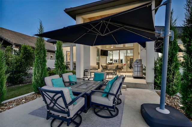 view of patio with outdoor dining area and fence