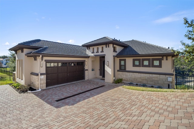 prairie-style home with a garage