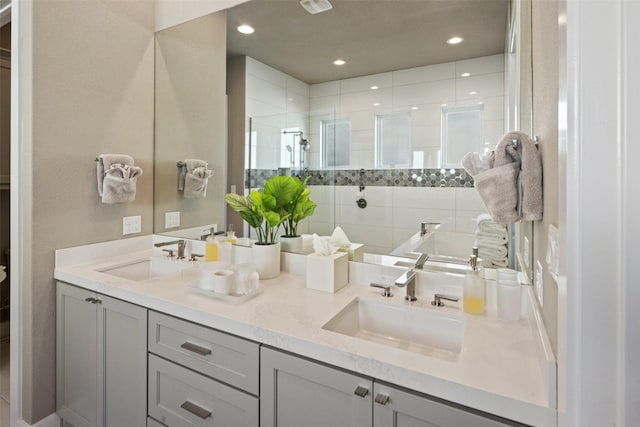 bathroom with vanity and an enclosed shower