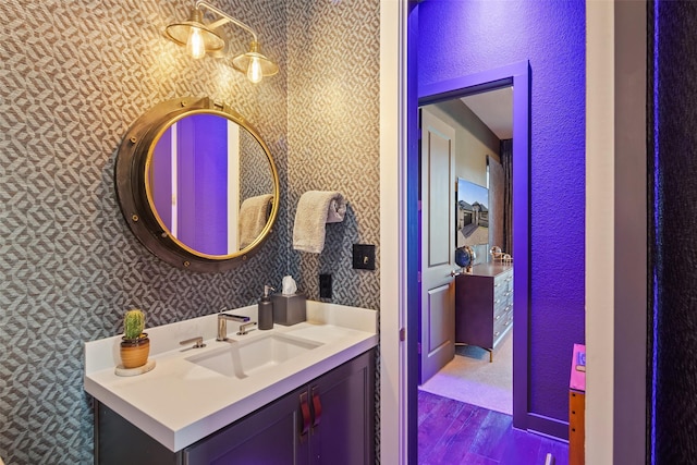 bathroom featuring vanity and hardwood / wood-style flooring