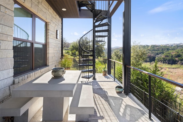 view of patio / terrace featuring a balcony