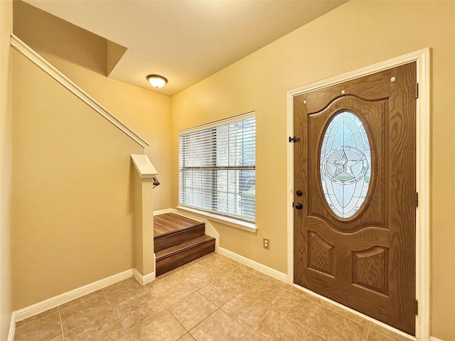 view of tiled foyer entrance