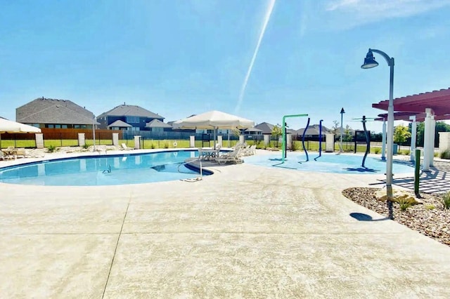 view of pool featuring a pergola and a patio area