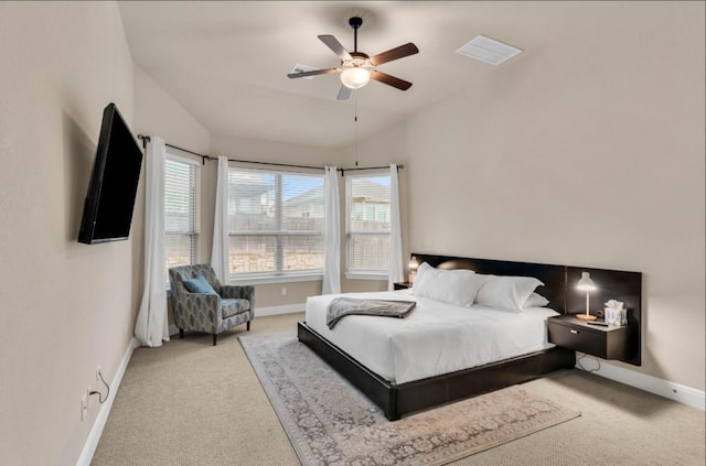 bedroom featuring vaulted ceiling, carpet floors, and baseboards