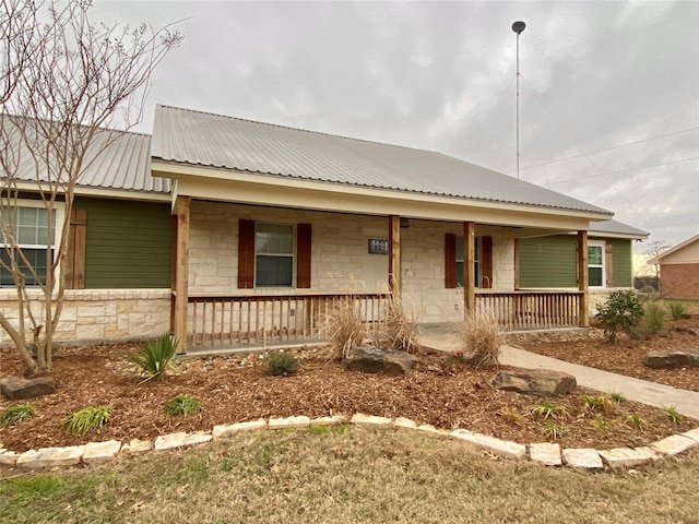 view of front of property featuring covered porch