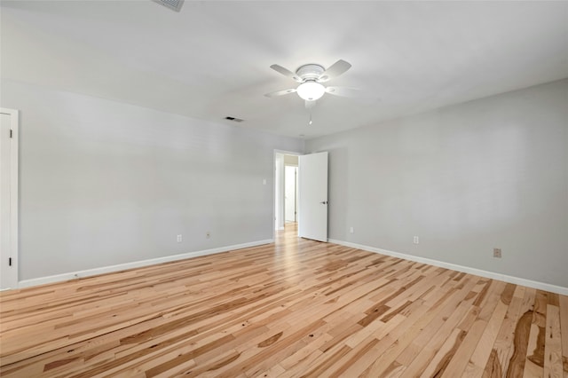 unfurnished room featuring ceiling fan and light wood-type flooring