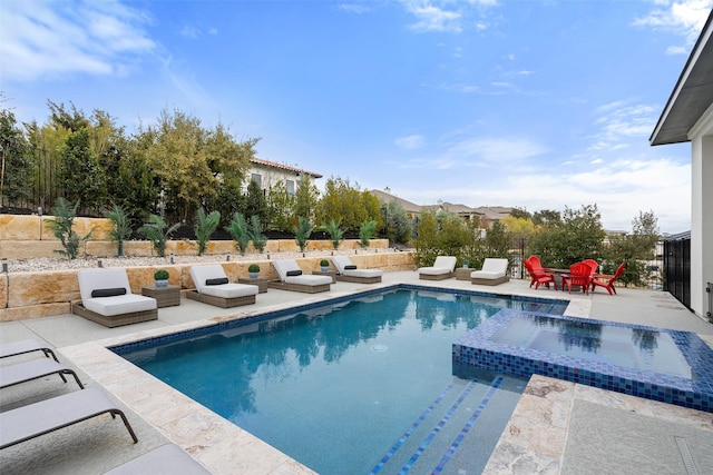 view of swimming pool with a patio