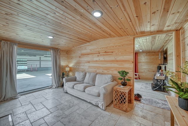 living room with vaulted ceiling, wood ceiling, and wood walls