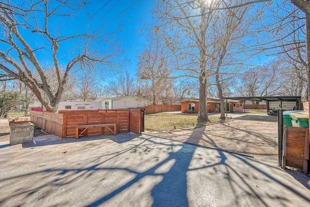 view of yard with a carport