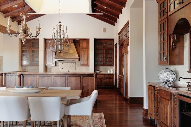 dining room featuring wine cooler, dark wood-style flooring, wood ceiling, a chandelier, and beamed ceiling