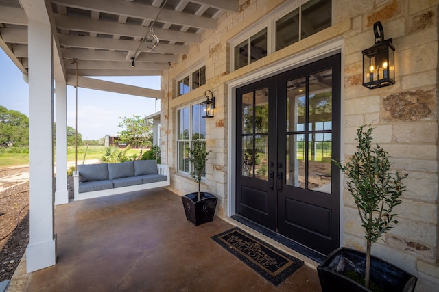 view of exterior entry with french doors