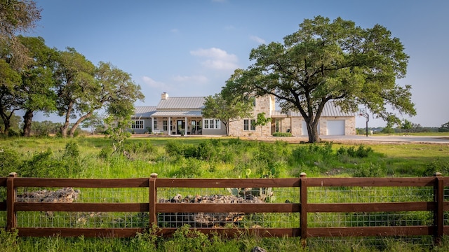 exterior space with a rural view