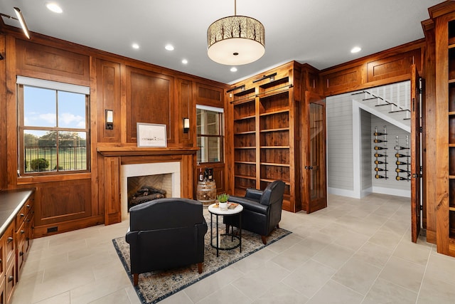 sitting room with wood walls