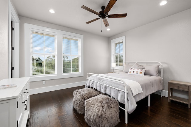 bedroom featuring dark hardwood / wood-style floors and ceiling fan