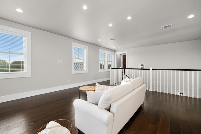 living room featuring dark hardwood / wood-style floors