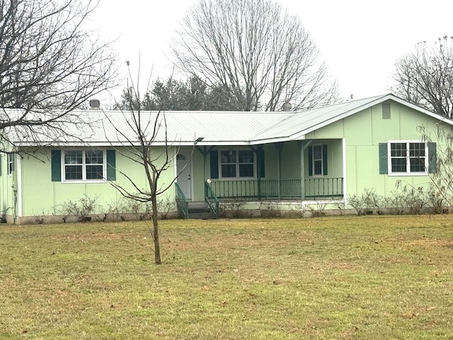 ranch-style home with a front lawn