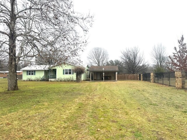 view of yard featuring fence