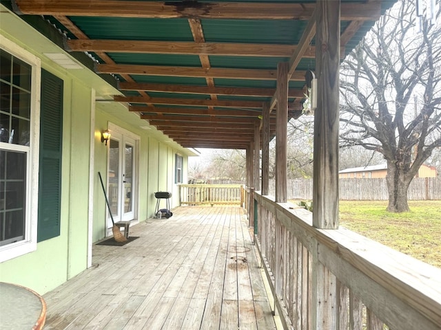 wooden deck featuring fence