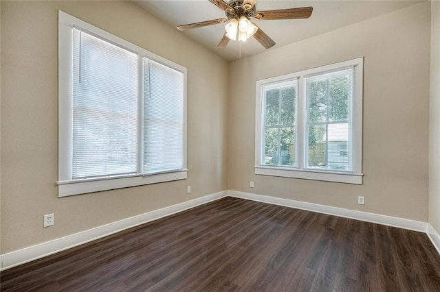 unfurnished room with dark hardwood / wood-style floors and ceiling fan