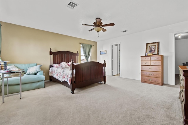 bedroom featuring light colored carpet and ceiling fan