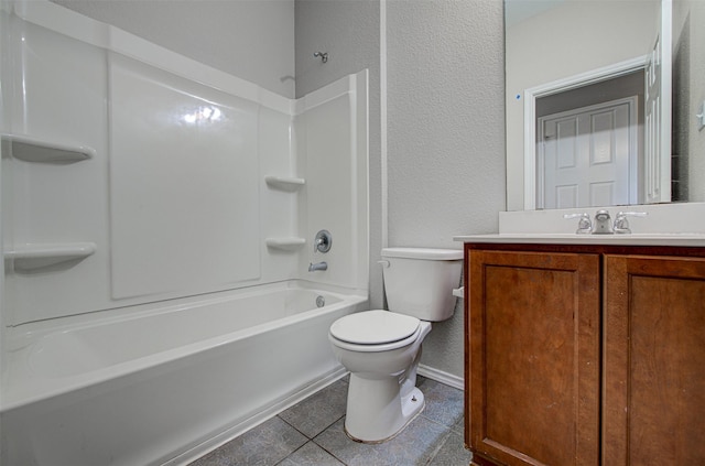 full bathroom featuring vanity, bathing tub / shower combination, tile patterned floors, and toilet