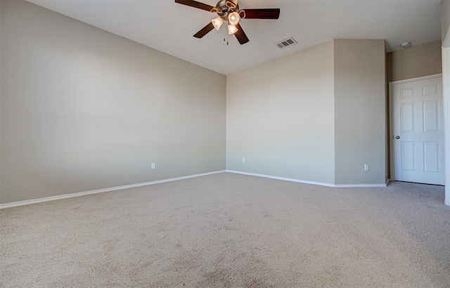 carpeted empty room with ceiling fan