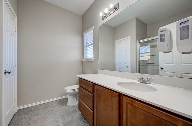 bathroom with vanity, an enclosed shower, tile patterned floors, and toilet