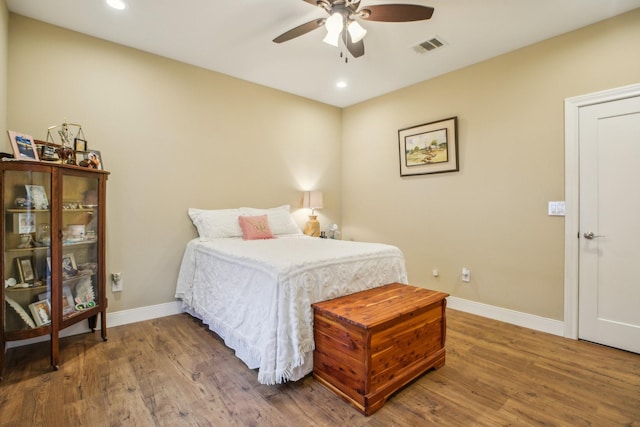 bedroom featuring ceiling fan and hardwood / wood-style floors