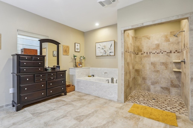 bathroom with vanity and shower with separate bathtub