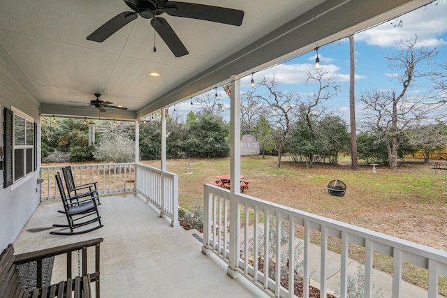 view of patio with a porch and ceiling fan