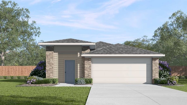 view of front of home featuring a garage and a front yard