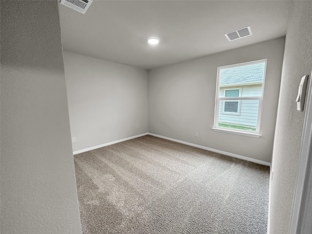 spare room with carpet floors