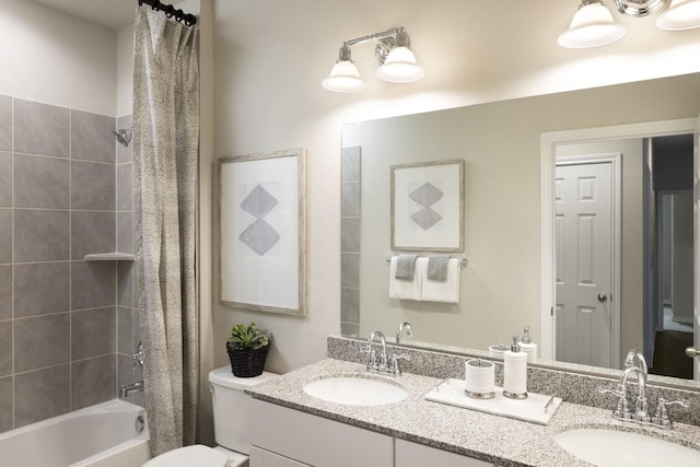 full bathroom featuring vanity, toilet, and shower / tub combo