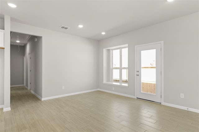 empty room featuring light hardwood / wood-style floors