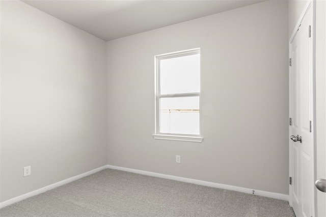 unfurnished room with carpet floors