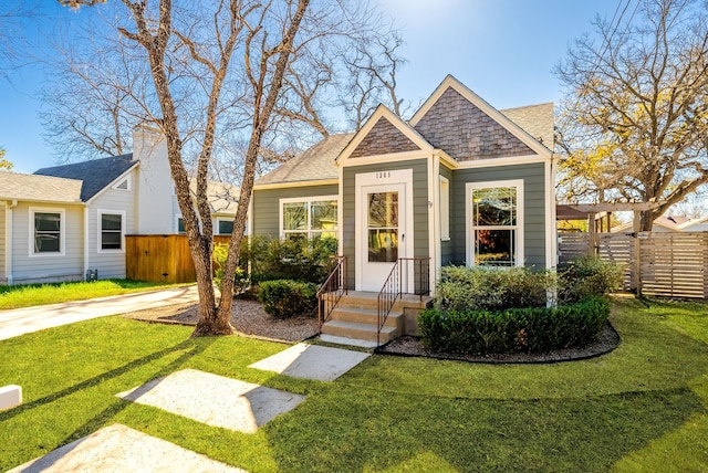 view of front of home with a front yard