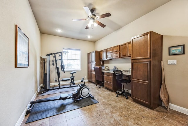 workout room with light tile patterned floors and ceiling fan