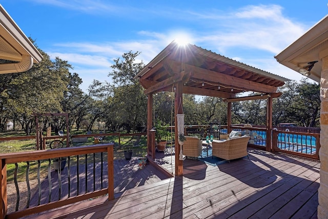 wooden deck featuring a pergola