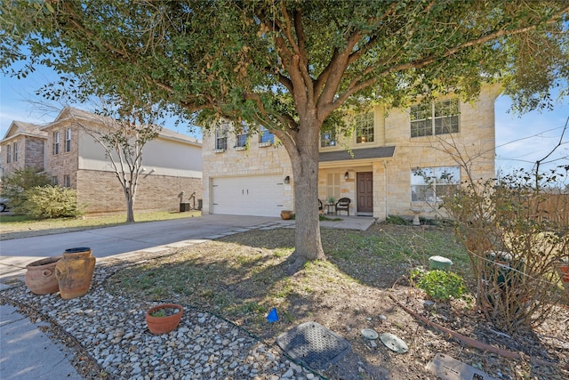 view of front of property featuring a garage